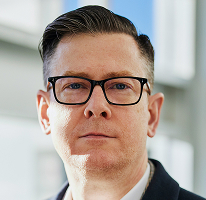 Alexander Hughes CEO-portret cryptohandelsbedrijf executive